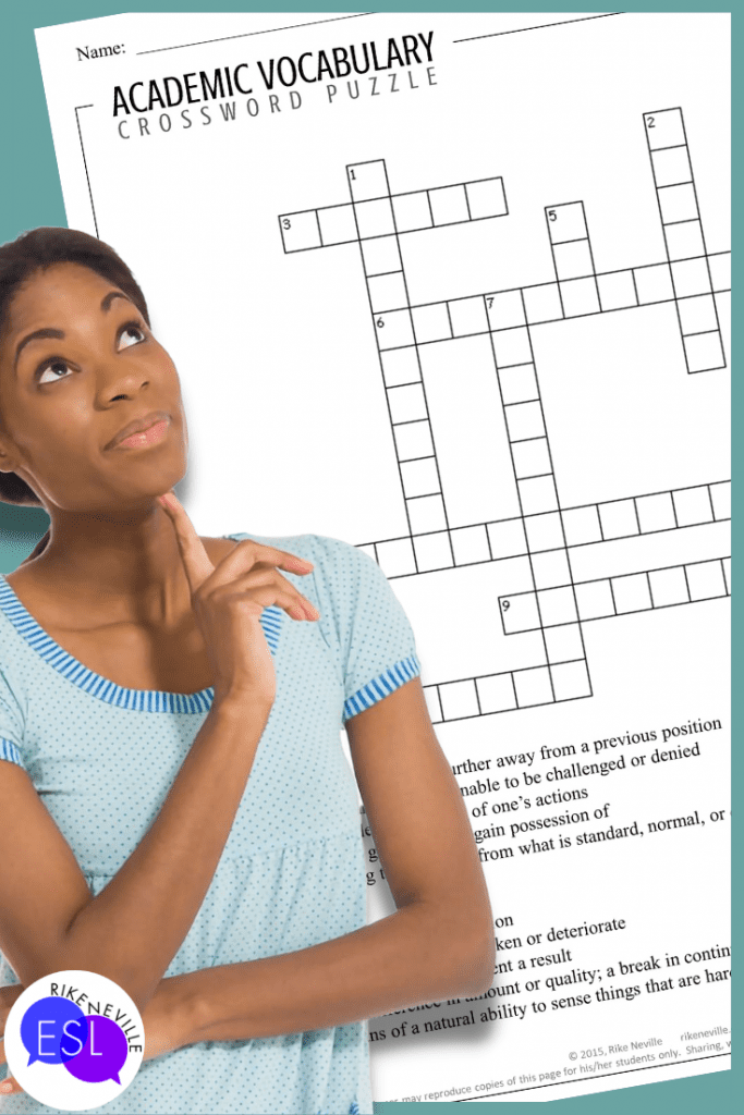 woman looks up while thinking about teaching academic vocabulary and using a crossword puzzle
